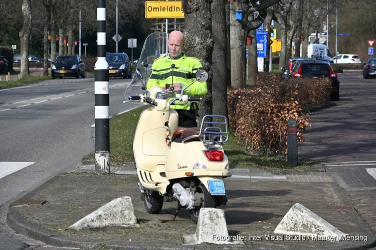 Aanrijding tussen fietsers en scooter in Bergen